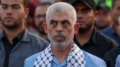 Getty Head of the political wing of the Palestinian Hamas movement in the Gaza Strip Yahya Sinwar attends a rally in support of Jerusalem's al-Aqsa mosque in Gaza City on October 1, 2022.