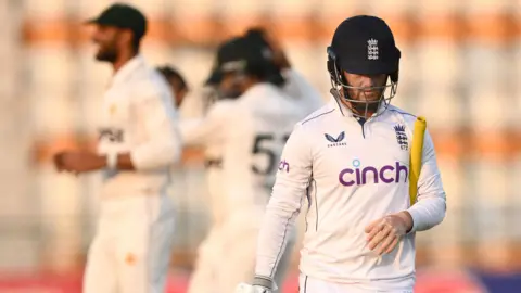 England's Ben Duckett walks off after being dismissed